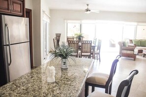 Villa (4 Bedrooms) | Private kitchen | Oven, stovetop, espresso maker, cookware/dishes/utensils