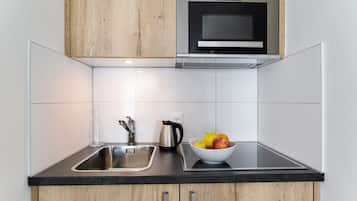 Apartment, 1 Bedroom | Private kitchenette | Full-size fridge, microwave, coffee/tea maker, electric kettle