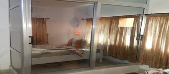 Nap Lodge is a home of hospitality and a private movie house with decent rooms.