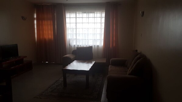 Departamento | Área de sala de estar | Televisión de pantalla plana 