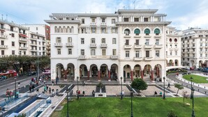 A large, historic building with multiple floors and a central courtyard. - Aristotelous Grand View (Thessaloniki)