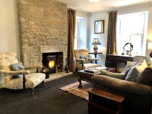 TV, DVD player, foosball, books