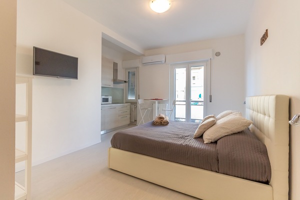 Estudio | Tabla de planchar con plancha, wifi gratis, ropa de cama