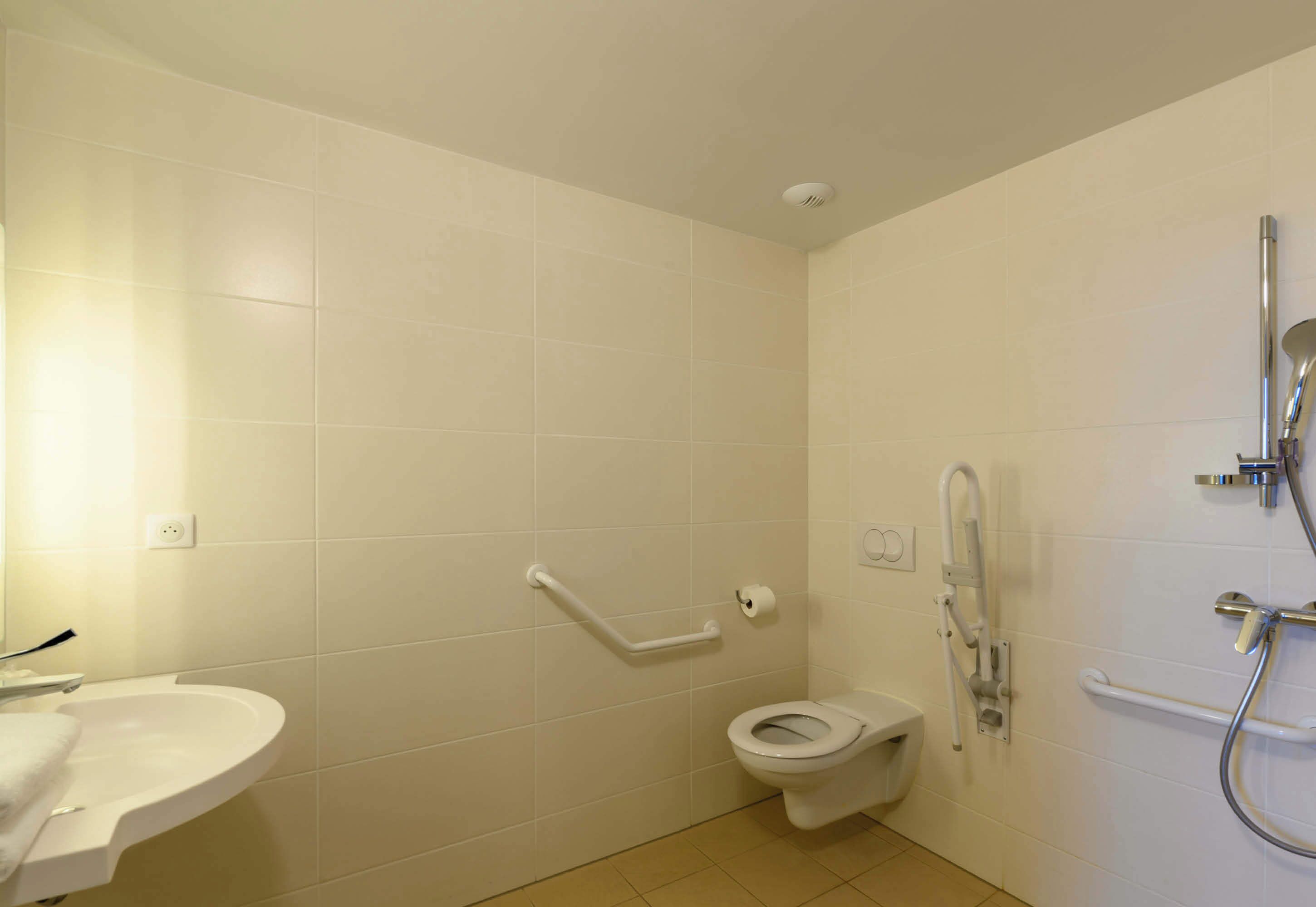 double room, mobility accessible | bathroom | shower, hair dryer, towels, soap