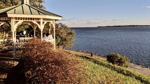 A gazebo with a green roof overlooking a body of water. - Your Annapolis Adventure Starts Here!!  (Annapolis)