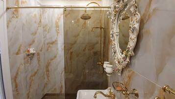 Shower, bidet, towels, soap