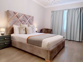Chambre Double Deluxe | Draps en coton égyptien, literie de qualité supérieure