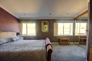 Departamento Deluxe, 2 habitaciones (Thistle) | Tabla de planchar con plancha, wifi gratis y ropa de cama 