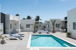 Outdoor pool, open 8:00 AM to 10:00 PM, sun loungers