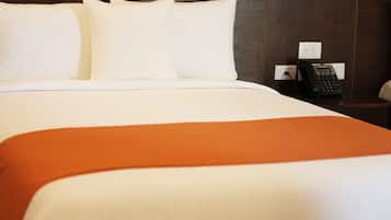 Premium bedding, down comforters, in-room safe, desk