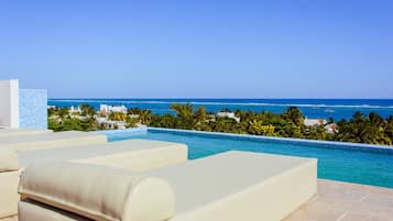 Kolam renang terbuka, kerusi lepak pantai