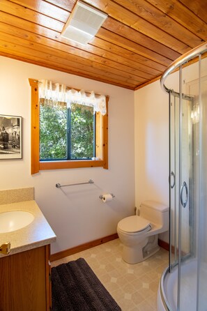 Bathtub, hair dryer, towels, soap