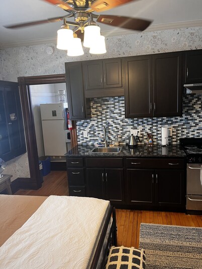 Romantic Second floor walk up Studio suite in central Marquette w sauna access