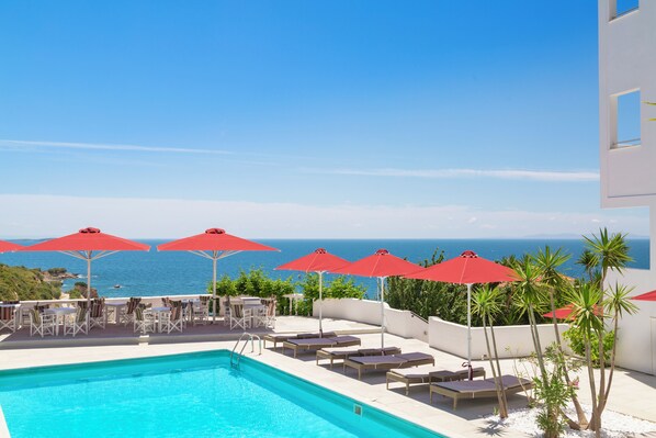 Seasonal outdoor pool, pool umbrellas, sun loungers