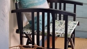 A wooden chair with a woven basket beside it. - Casadelmar - Prime Position, With Sea Views (Marion Bay)