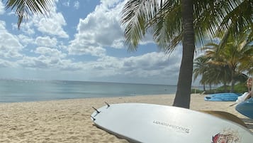 On the beach, sun-loungers, beach towels