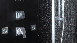 A shower enclosure with a digital display, control buttons, and a water flow control lever. - Luxury Villa with privet outdoor swiming pool. (Kundasale)