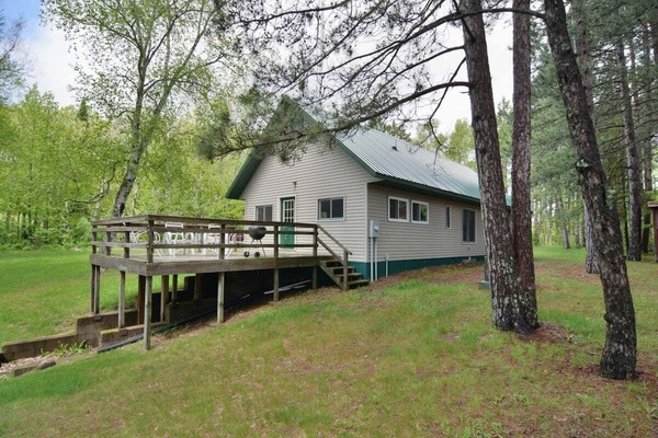 Homestead House is located on Drummond Lake