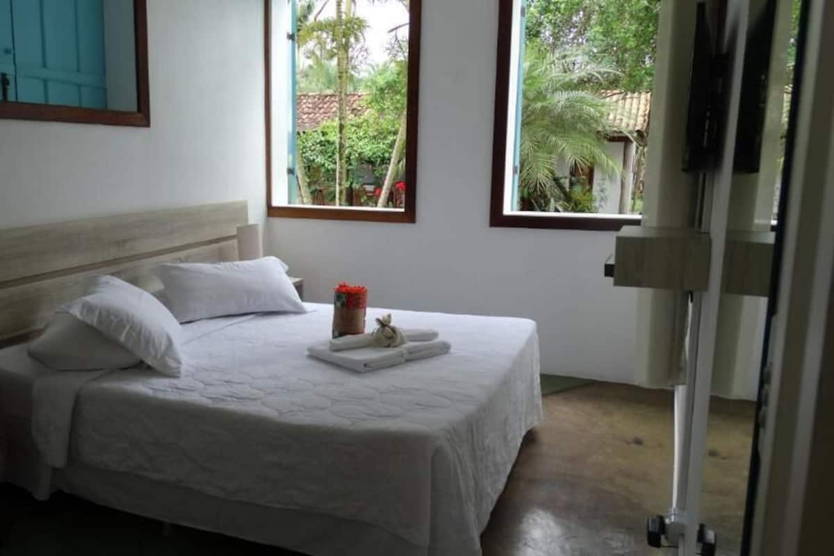 Standard Quadruple Room, Courtyard View | Minibar, blackout drapes, bed sheets
