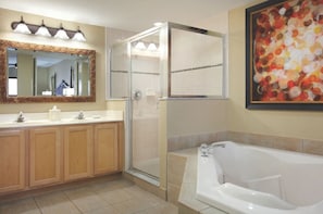 Combined shower/tub, hair dryer, towels, soap