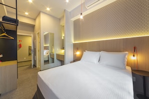 Pillowtop beds, individually furnished, laptop workspace - Nomah - Aptos por Temporada na Vila Madalena (São Paulo)