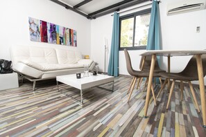 Apartamento, 1 habitación | Zona de estar