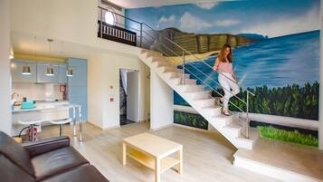 Deluxe Studio (Mar) | Living area | Smart TV