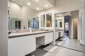 Bathtub, hair dryer, towels, soap