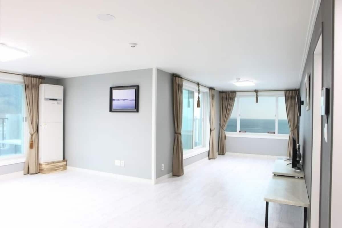 Condo, Ocean View (Rooftop Ondol) | Living area | Flat-screen TV