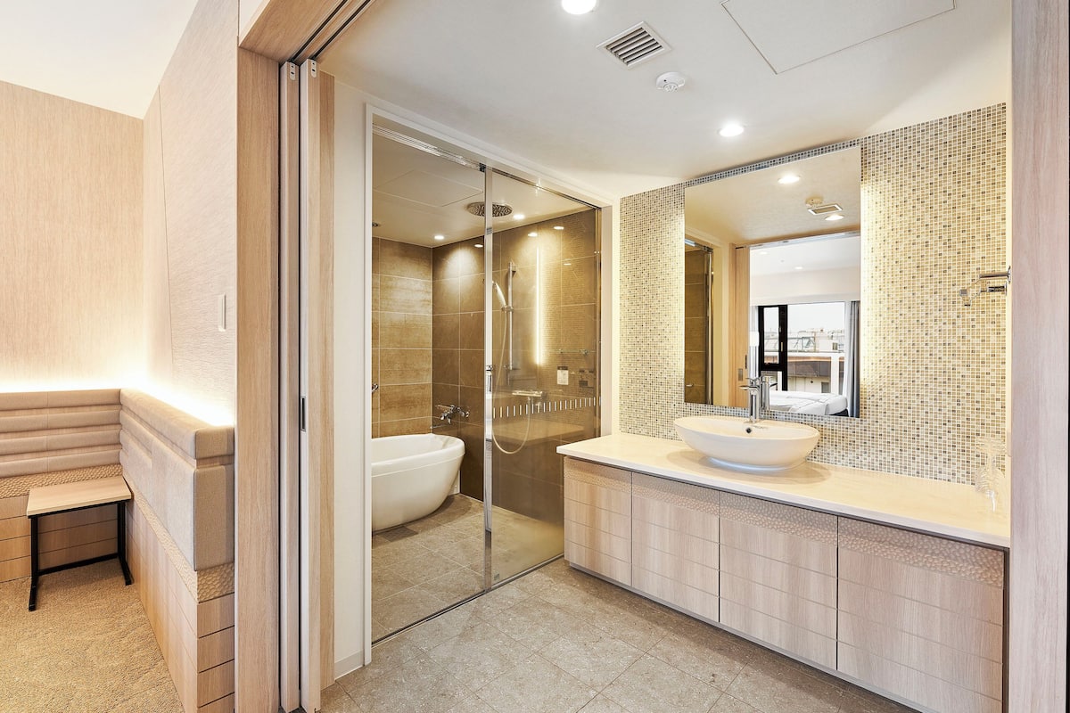 junior suite room - non-smoking | in-room safe, desk, laptop workspace, blackout curtains