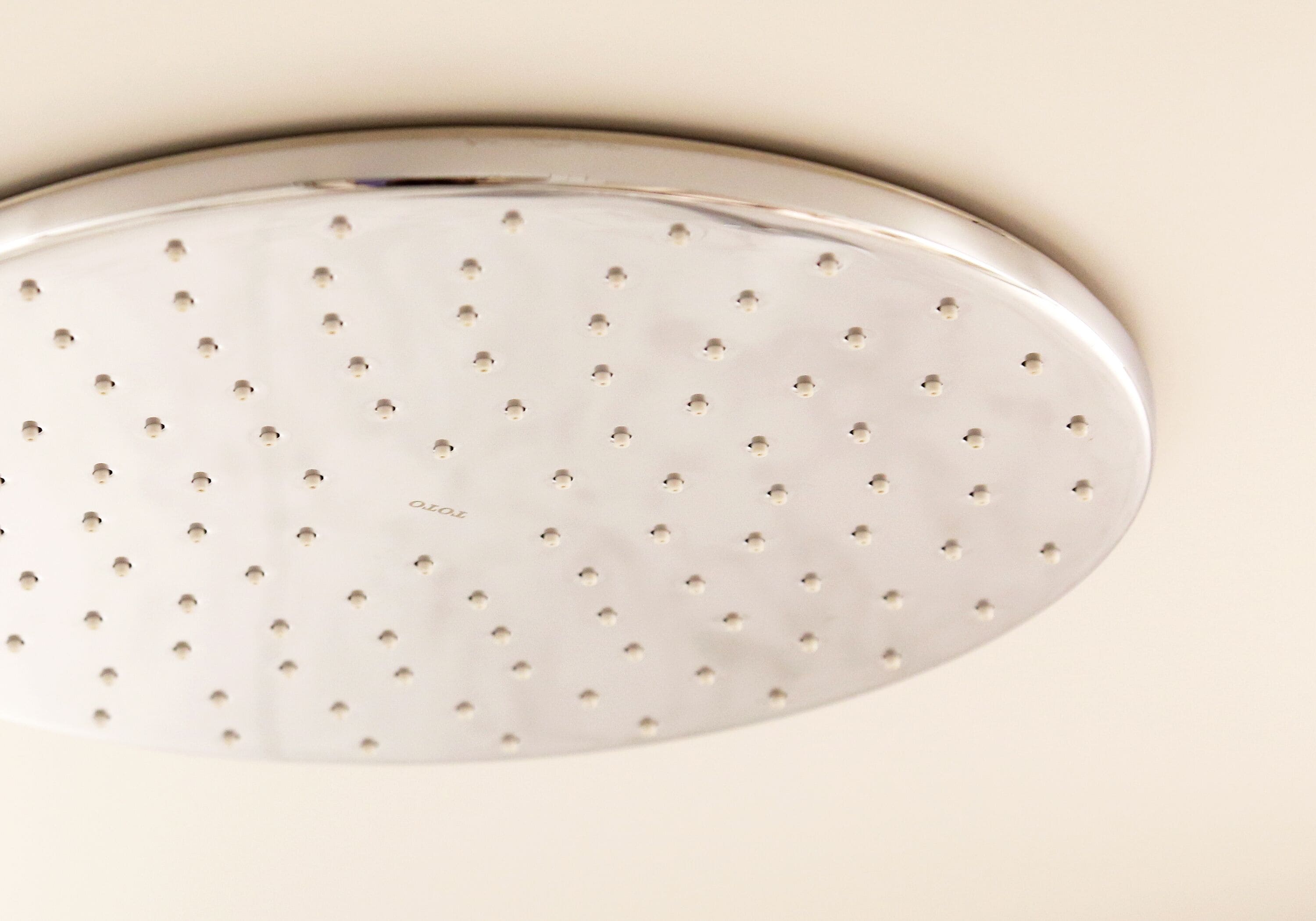 A ceiling with a perforated metal design.