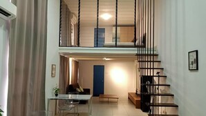 Dúplex, 2 habitaciones | Zona de estar