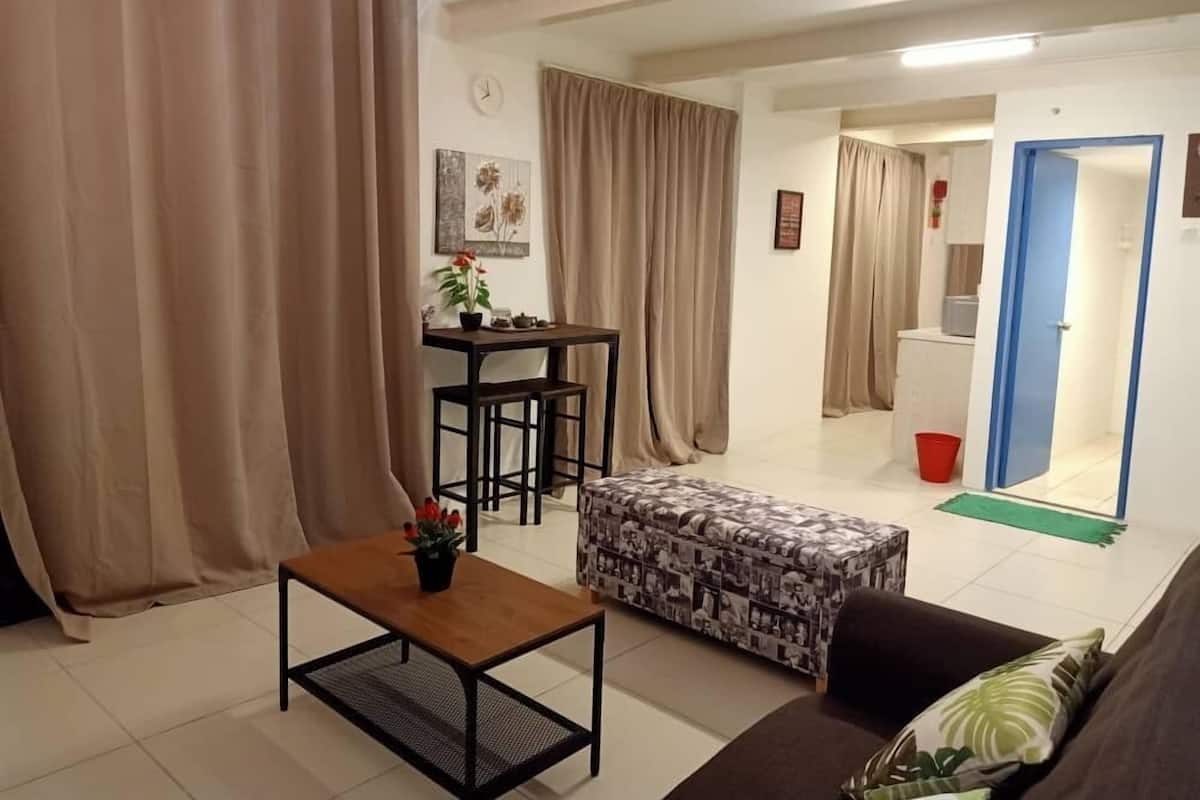 Appartement Duplex | Coin séjour | Télévision à écran plat