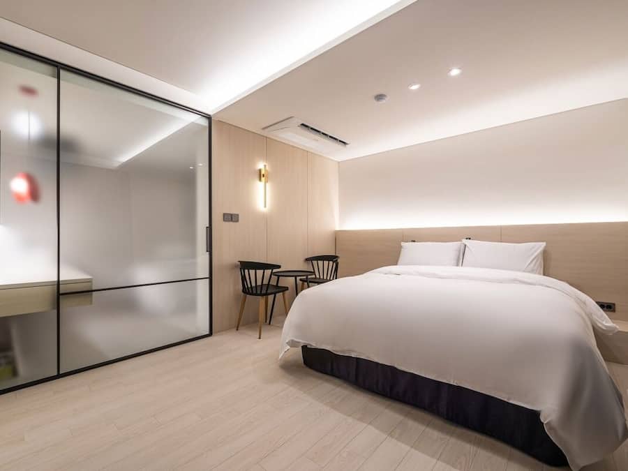 Premium bedding, down duvets, blackout curtains, free WiFi