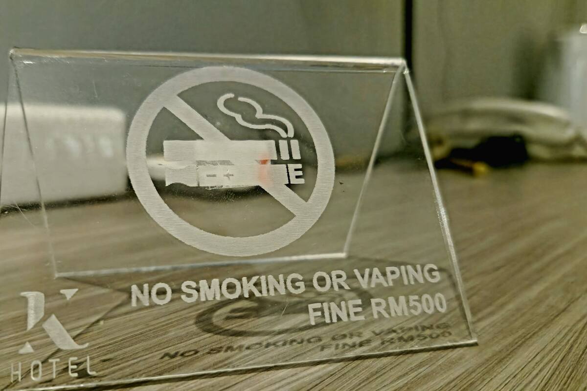 desk, iron/ironing board, bed sheets