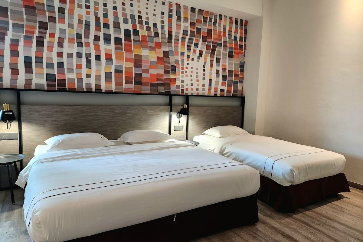 family room | desk, iron/ironing board, bed sheets