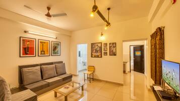House with 2 Bedrooms (4 Adults) | Living area | 32-inch Smart TV with satellite channels