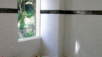 Family Quadruple Room | Bathroom | Combined shower/tub, spring water tub, hair dryer, slippers