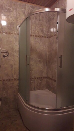 Shower, rainfall showerhead, hair dryer, towels