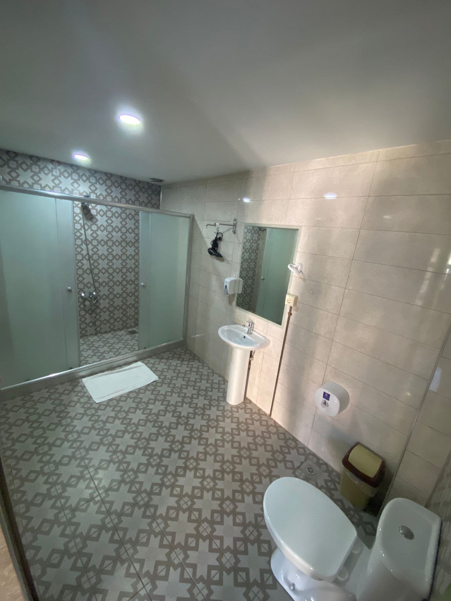 family room | bathroom | shower, slippers, towels