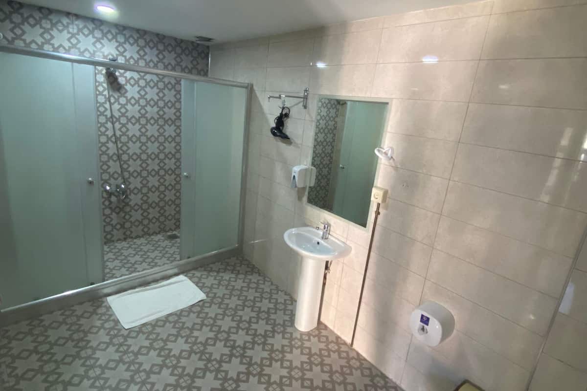 family room | bathroom | shower, slippers, towels