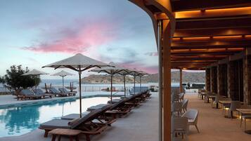 Indoor pool, seasonal outdoor pool, pool umbrellas, sun loungers