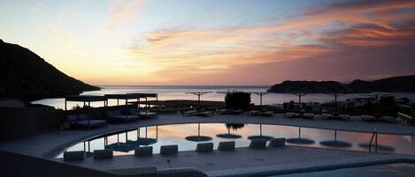 Indoor pool, seasonal outdoor pool, pool umbrellas, sun loungers