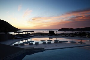 Indoor pool, seasonal outdoor pool, pool umbrellas, sun loungers