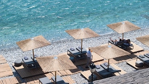 Beach nearby, free beach shuttle, sun loungers, beach umbrellas