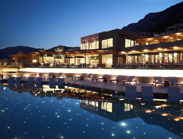 Indoor pool, seasonal outdoor pool, pool umbrellas, sun loungers