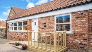 The Old Tractor Shed | Terrace/patio - Village Farm Cottages. (Driffield)