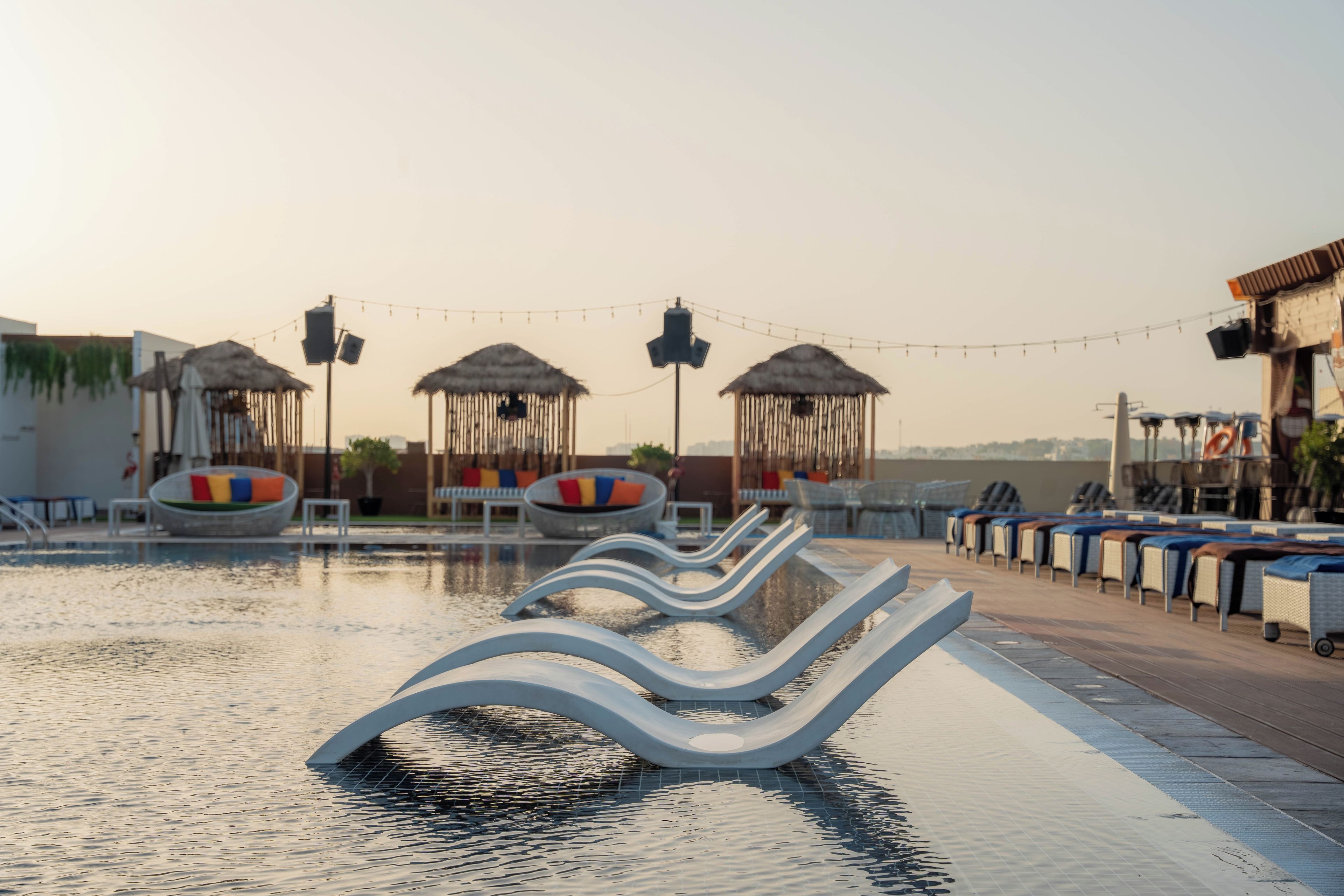 Outdoor pool, pool umbrellas, sun loungers