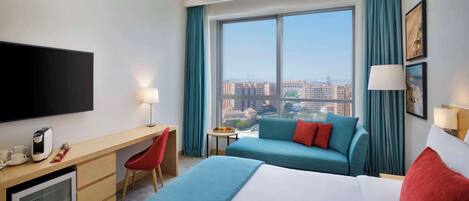 Executive Room | 1 bedroom, minibar, in-room safe, individually decorated