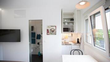 1 chambre, fer et planche Ă repasser, Wi-Fi, draps fournis